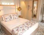 Royal Beach Hostel & Suites